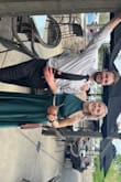 I loved this dress and it looked gorgeous! The material was great, but during the night a button popped off the top, and the hook at the top of the skirt came off too! - Joelle C.