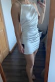 Happy with this dress, it is tighter on me around the hips/butt (any tighter and I would have to return) but looser up top, so if you are bustier I would say you definitely have room to fill this out more than me! The adjustable back straps are nice for getting a closer fit. The draping on the front and the "V"cut in the back are very flattering. It is lined. Fabric looks and feels good quality. - Elizabeth B.