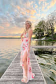 Beautiful dress but a little long even with heels on. The top is a little loose and would stay put better if you had a larger bust as the straps aren't adjustable. Overall, received many compliments on this dress! - Grace H.