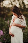 Absolutely loved this dress. I wore it for my maternity photos! Ordered a small! Pre-pregnancy I'm a size 2-4, 115-120 lbs. I was 31 weeks and 133lbs when I wore it. Photographs beautiful! Medium was too big! - Alexandra W.
