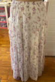 I have been looking for the perfect skirt to wear to events this Summer. I was worried about the fit and the length. Luckily, it consists of an elastic waistband and the length is perfect. I usually buy small and consider this a perfect fit. I would say it would be too long for those who consider themselves petite. - Sarah K.