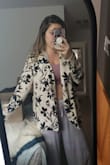 This is definitely an oversized fitting item, so I probably could have worn a small. It isn't super thick so it would probably work in summer. Nothing wrong with it at all, just didn't like how it looked on me so I ended up returning it. - April L.