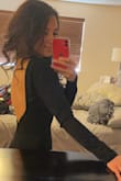 A simple, classy, body con dress with a beautiful dipped back. Snug, but comfortable, I felt like the dress really held me in. Wore it to a gala, would be great for a fall/winter or evening wedding, would order it again in a heartbeat! - Jessica