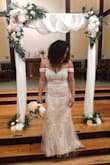 Wore this to my wedding this weekend.. beautiful and well-made dress. So in love with it.. the detail is everything. I gave 4 stars because there is very little hip space and it does make u look a lil boxy...I added a belt that gave the illusion of a smaller waist - Naomi S.