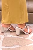 I love this style of heels because they are so easy to slip on and go, but the straps on this one were too wide my feet kept sliding off to the side. My toes had to do a lot of gripping to keep these heels from coming off. If you have narrow feet like me, I would consider sizing down. I still like to wear them, but I will not be ordering in other colors. - Jasmine C.