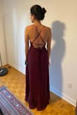 Very pretty dress! It's super flattering, the straps and back are adjustable, so you can get the right fit for your body! The dress is pretty long (I'm 5"8) but it should be perfect with heels! - Adriana T.