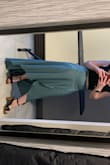 LOVE THIS SKIRT! I really love the fit & flow, but I am REALLY short, & it does hit the floor even with 4" heels. I have it in another color, and putting it in the dryer did the trick - not sure about the actual care instructions. I did get a ton of compliments on it, which was cool - Maddie B.
