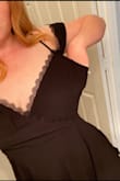 This was a cute dress and the size chart told me to order a large, but there was so much extra room in the armpit area that I could fit a whole hand in the dress without stretching it at all. If you think you're in between sizes, I would order the smaller one. I was also not a huge fan of the fabric, it seemed very prone to wrinkles. - Courtney M.
