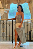 This dress is AMAZING! I wore it for a semi-formal wedding and received so many compliments. It fits like a glove and the rouching on the front hides the cocktail hour/dinner food belly. My bust has developed some sagging over the years from overwearing bandeau's, but this held and covered them up nicely without a bra. I don't know if I would recommend this for ladies with a bigger bust, as it may be too tight.

There were 2 flaws on the dress; The first one being the zipper and the second was a stain. There's a plastic covering at the top where the metal clasp is, so I wasn't able to zip it all the way up. The plastic coating chafed my underarm and left it raw by the end of the night. There was also a weird stain on the dress that I missed because of the wrinkles on the fabric. Be sure to look over the dress before making any returns to avoid these issues.

Other than the two defects Im obsessed! I pared it with Lulus pearl clutch and pearl hair clips. - Antwanisha S.