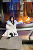 This beautiful jacket has a serious "WOW" factor. Got many compliments everywhere I went. It feels luxurious and will totally make your outfit. If you want to feel like a queen or go out for a special occasion in the cold, this jacket will be your best friend. Bought it for my winter birthday and was not disappointed. It is my favorite dressy winter coat now and is extremely cozy. - Arynn P.