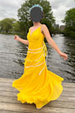 Fit perfectly except for the length, but because of my height, I almost always have to get dresses hemmed. - Anya Q.