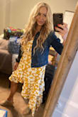 Obsessed with Lulus sundresses! I'm almost always a size 8 in women's clothing. I'm very large chested with a large rib cage, so a size large fits, but is snug across the chest in almost all of Lulus dresses. I do need a cami and slip for this dress or feel naked in this due to it being a wrap dress. It only ties and there isn't a button to keep it on but so worth the style. Way cuter than I even imagined when I ordered it. - Maria B.