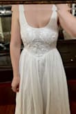 I bought this dress for the awesome skirt and waistline and was not disappointed. It is heavy linen with nice swishy movement. The top is definitely not the same quality (thin, see-through fabric and clumsy seams) but I sewed on some appliqué and now I'm in love. Perfect base for a DIY! - Kate S.