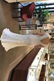 Although I ended up purchasing a different dress for my wedding this was my runner up and I love it. I was very impressed with the fabric and detail and highly recommend this dress to anyone. - Shannon L.