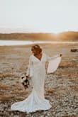 I am so happy that I decided to purchase this dress for my elopement. The quality of this dress was everything! It does run small so definitely size up. I ended up getting alterations because I'm super short but it all worked out perfectly. This dress was worth every penny. - Shayna G.