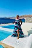 I usually buy a large but went with a medium and it fit great and was very comfortable to wear. I wore it in Greece and it was perfect. - Shalaine C.