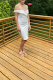This dress is really pretty. The material is good, it's well made, and it's flattering... just not on me. I have such a small chest that it didn't look good on me and I couldn't get it to stay up. As long as you have the chest to fill it out, I think it's 5 stars. I ended up returning it. - Lauren H.