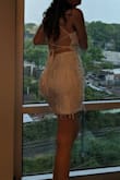 I wore this dress for my bachelorette party. It hugged my curves well, and even though it didn't have cups or support in the bust the fringes hid any unflattering nippage so I didn't need to wear a bra. - Jaime L.