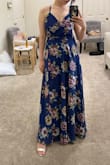 I wore this dress to my sister's wedding and it was perfect. I'm 47kg with a large bust so I was a little worried it wouldn't fit right. Also, I live out of the country and had it delivered to the States so I took a risk. I had to get it hemmed but other than that, it was beautiful. I wore a strapless bra and the button of the dress didn't pop open. - Rebecca H.