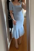 Ugh love love love this dress! It is so pretty in person and hugs curves in a really flattering way. It's a little snug in the midsection, but that's a me problem, not the dress haha I run in between sizes and went with the smaller option. I would say it fits true to size! - Shannon H.