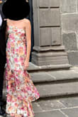 I wore this dress for a formal wedding and got a lot of compliments. People even asked who the designer was so that tells me it looked of nice quality! I usually wear a medium but it was too large in the stomach and bust areas so ordered a small and it fit great! - Brooke H.