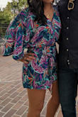 I absolutely loved this romper. It was a TAD short per my preference, but I wore it anyway with no issues. Sizing up would have made it too big. Got a ton of compliments. - Veronica L.