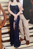 I didn't want to take this dress off because it makes me feel so beautiful! It accommodates my curves well and doesn't make me feel like I'm playing dress-up in spite of the sparkles. I'm short, so it does pool a bit on the floor when I wear it. - Katie B.