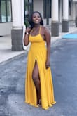 I am in love with this dress! I am pretty busty and have long legs so I was sketchy regarding fit and length. I ordered a medium and got a great fit. The material is really nice and the length is long so you basically float into the room. I did have a little side boob action which would be reduced once I adjusted the straps. The color is exactly the way it's pictured, it looks amazing on my skin. I purchased the yellow and later purchased the green as well. I am now a loyal customer of this brand! - Chanice S.