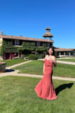 It was a beautiful dress to wear to a destination wedding. The color complimented my skin tone and it was very comfy. It is very long so I had to get mine hemmed but overall satisfied with this dress! - Grace L.