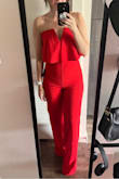 Loved this jumpsuit- I didn't wear it for my bday dinner but I will save it for a later event! Fits snug but the material has a nice stretch. I ordered the small, but the torso was too short. The medium fit perfectly. The pants legs were slightly long- would need to be hemmed or a heel (I am 5 foot 6). But other than that really nice!! - Jessica S.