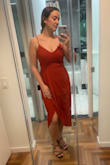 The fit is perfect and the dress is beautiful. I ordered red and it's a little more like burnt orange, material isn't what I expected but still love it! - Sam T.