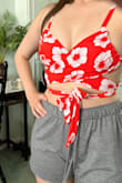 I LOVE this top. While it's a bathing suit, I think it looks really cute as a summer top. The fabric doesn't seem to hug the bust as it does on the model (yes, our proportions differ, but our sizes are the same), but it still fit well.
My only gripe was the peculiar straps on the back. The bottom part of strap is not secured, so they tend to slide toward the center. This makes the height of the underarm fabric fit a little funny when you move around.
Overall, still ADORED this ~ - Milly C.