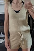 Loved the shirt and the shorts. Ordered XS and the fit is right, however the shirt is a bit too short and not as loose as in the picture. - Daniela I.