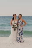 This dress fit absolutely perfectly... except for the 4" I had to get hemmed from the bottom. Got it for my friend's beach wedding and I loved it. - Tera M.