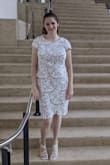I wore this to my graduation and it was perfect! I got so many compliments! The size was a tiny bit loose, I probably could have gone down to a medium for a tighter fit but it was fine. The fabric is a little bit on the thicker side so I maybe wouldn't recommend wearing it on a super hot day. - Sarah G.