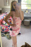 The dress is adorable! It fits very true to size and me having a wider butt and bigger thighs fits perfectly! The dress doesn't have much give though and the material is thicker but I love the straps and everything else about it, and it's not too short and doesn't ride up! Can't wait to wear it to the wedding I'm attending! - Rachael C.