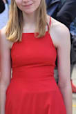 The seam on the bust area ripped on the day of graduation, thankfully we were able to sew it. Other than that it fit great. - Amanda P.