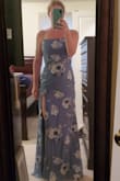 Nice material. Lightweight but lined so not too thin. Slit is high, but looks good. Lined enough to not need a bra or nip coverings. Wearing it to a June and October wedding - Shellie T.
