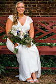 This dress is beautiful. I'm a size 14 and ordered an XL. Only drawbacks is its a little long in the front. I'm 5'4 and had it taken up slightly in the front. The back also takes a long time to button. You will have to have someone help you and probably use a crochet hook to help button. Other than that I felt very beautiful and comfortable. I also received many compliments. This dress is great quality for the price. - Amy G.