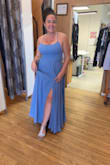 Like everyone else says, it's very long and the slit was up to my navel. This pic is right after I picked it up from the tailors. You will definitely have to have this done if you're below 5'9". It's a great color and the quality is amazing. I can't wait to wear it to my sons wedding. - Aminta L.