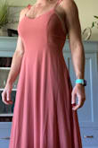 I wanted to love this so much. I loved the cut, quality and the detail but the color was just way more muted in person than on the what shows on the website. I bought my true to size Medium which fit everywhere really well. It isn't super supportive in the chest but it's still enough support that I would have been comfortable had the color been right. I ended up returning it and going for something else. *and I have no clue why the second picture loaded sideways - Mariah E.