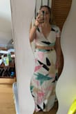 I love the material super breezy and light. Since I was trying to cross around my waist for the top, I feel like the tissue could be longer, but if tied like in the picture, it looks great! I have some pounds to lose at the waist for the skirt to be more comfortable, but I can't wait to wear it at my friend's wedding. - Elsa B.