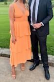 This dress was so fun to wear to a wedding in June! I got so many compliments on the color and style of this dress! - Kaitlyn B.