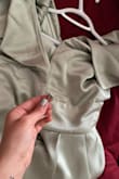 After I purchased this 2 months ago, I was so excited to wear this to my best friend's wedding (color scheme) and had tried it on once to make sure it fit and it was perfect, minus a little issue with zipping but it zipped... Fast forward to this past Saturday, the dress would not zip. I tried to get my boyfriend to zip it and it kept getting stuck somehow. So I took it off and tried just to unzip and zip it without wear, and low and behold, the whole zipper lining comes un-done, breaks, and rips... my bf, bless his soul, tried to fix it even though it was clearly ripped, then the zipper broke right off. Terrible and heart breaking trying to get ready for my best friend's wedding. Such a pretty dress with such TERRIBLE and CHEAP material. and since it's past the "14 days to return" I'm out $80 because of CHEAP material and sewing. - Nari S.
