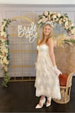 Gorgeous dress for my high tea bridal shower - looks so lovely draped when sitting down too!! I'm 5'4, 129lbs with a 29" waist and size M fit perfectly. - Lyndsay W.