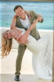 This dress is perfect for a destination ceremony! It fits snug in all the right places, has beauty lace, moved with you while dancing, has a lovely train, and folds and packs in a suitcase without wrinkling. We had a vow renewal ceremony at Sandals Montego Bay, Jamaica for our 20 year anniversary and it was perfect! - Emily B.