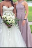 I wore this dress to a wedding and it was perfect fit, looked great, and was able to move around comfortably. That's great because I was 13 weeks pregnant at the time. - Kasey M.