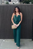 I officially want this jumpsuit in every color! I did need to get it hemmed because I'm 5'5 and it was a bit long. I didn't have to wear a bra (huge plus) and it fit like a glove! I usually wear a medium, but after reading reviews I went with a small and I'm glad I did. I got so many compliments all night! It's also super stretchy so perfect for dancing, eating, etc! - Tara M.