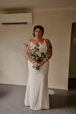 Overall it's a stunning dress, the material is thick but doesn't hide anything. You can see cellulite, outline of tummy, belly button etc. Which is my big insecurity. But this is my dress wedding dress. So simple and elegant. Timeless. I made it work with the right shapewear to smooth everything out. I cannot wait until I Marry in this. Highly recommend. Shipping was super fast to Australia also. - Jordan C.