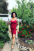 The dress fit like a dream. The material is good quality and soft to the touch. It's very comfortable and hugs my body in all the right places while hiding the ones I'm not confident about like my mom pouch. I wore this to my graduation and I felt beautiful. Paired it with my grandmothers Ukrainian scarf which brought the beautiful wine color. - Joy W.